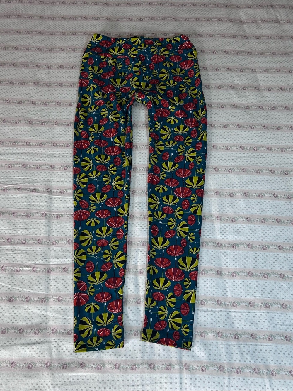 LuLaRoe Navy Skinny Jeans with Red and Yellow Floral Print